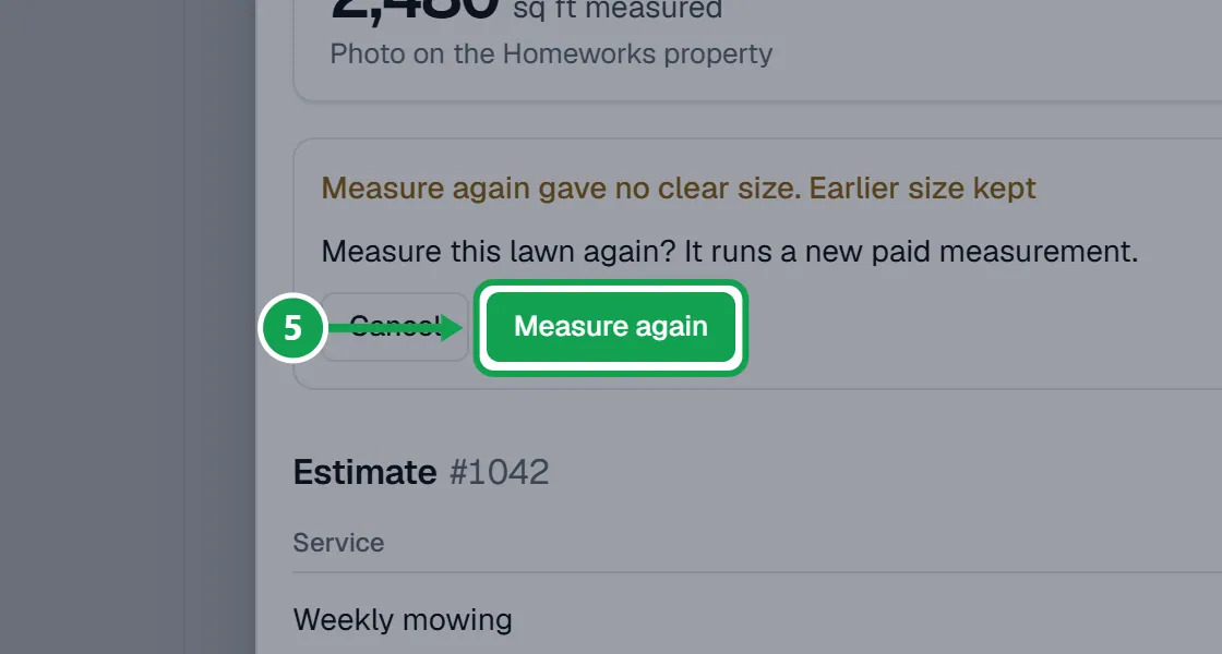 Step 5: It asks Measure this lawn again? It runs a new paid measurement. Press Measure again to confirm, or Cancel. The part to press is outlined in green.